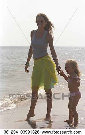 woman, child, beach, ocean, 30s View Large Photo Image Stock Photograph - woman, child, beach, ocean, 30s. Fotosearch
