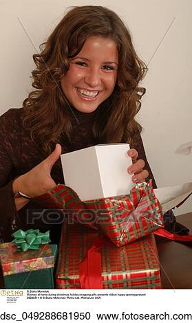 woman, christmas, time, wrapping, gifts, presents, ribbon View Large Photo Image Stock Image - woman, christmas, time, wrapping, gifts, presents, ribbon . Fotosearch