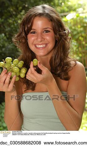 woman, outside, eating, grapes View Large Photo Image Stock Photo - woman, outside, eating, grapes. Fotosearch