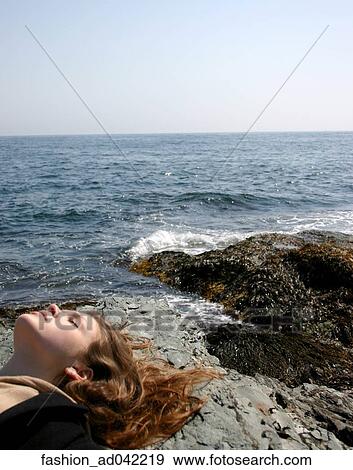 Woman, Rock, Sunbathing, Cold, Water View Large Photo Image Stock Photo - Woman, Rock, Sunbathing, Cold, Water. Fotosearch
