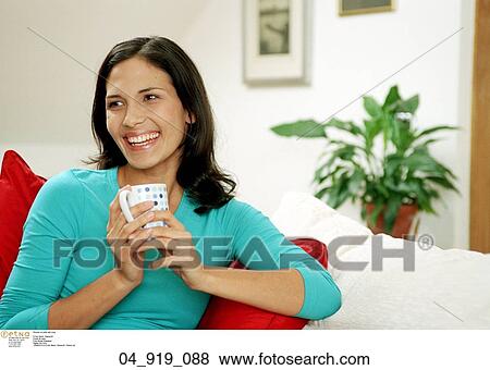 Woman, Smiling, Sitting, Relaxing, Inside, Home, Happy View Large Photo Image Stock Photo - Woman, Smiling, Sitting, Relaxing, Inside, Home, Happy. Fotosearch