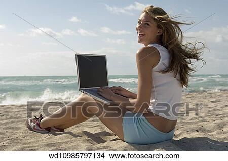 working, holiday, working, abroad, windblown, hair View Large Photo Image Picture - working, holiday, working, abroad, windblown, hair. Fotosearch