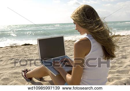 Stock Photo - working, holiday, working, abroad, view, behind. Fotosearch