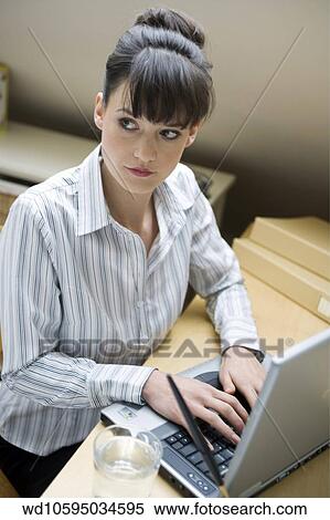 working, image, 35, twenties, solo View Large Photo Image Stock Photography - working, image, 35, twenties, solo. Fotosearch