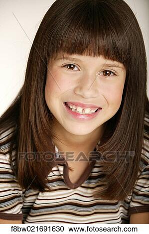 Stock Image - young, brunette, Portrait, Color, vertical, Latin. Fotosearch