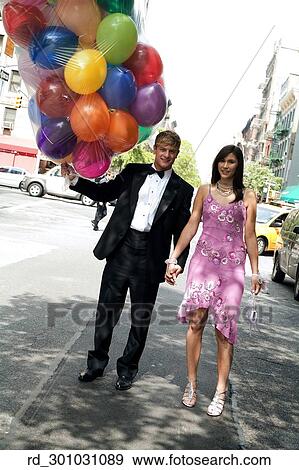 young, Vertical, Tuxedo, Prom, Pink, Dress, outside View Large Photo Image Stock Photo - young, Vertical, Tuxedo, Prom, Pink, Dress, outside. Fotosearch