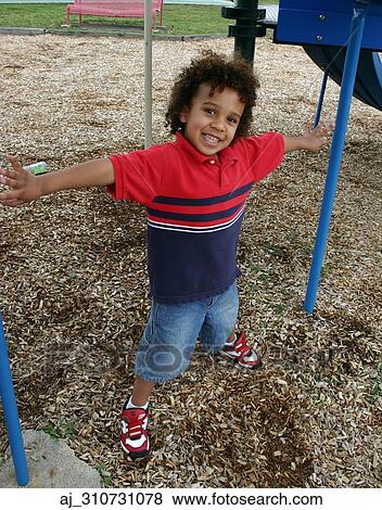 youth, Stripes, stretching, standing, sneakers, playing, playground View Large Photo Image Stock Photo - youth, Stripes, stretching, standing, sneakers, playing, playground. Fotosearch