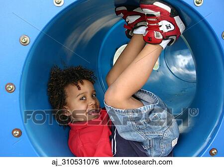 Stock Photograph - youth, tunnel, tube, Stripes, sneakers, playing, playground. Fotosearch