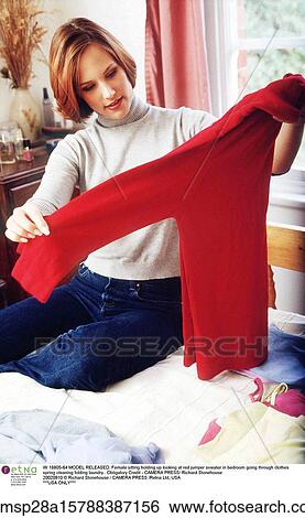 Stock Photograph - autumn, folding, european descent, clothed, at home. Fotosearch