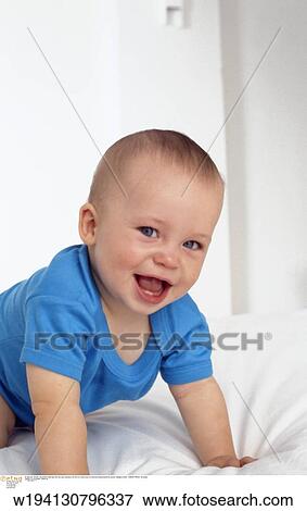 babies, solo, families, 9 months, vertical image, under 12 months, smiling View Large Photo Image Stock Photo - babies, solo, families, 9 months, vertical image, under 12 months, smiling. Fotosearch