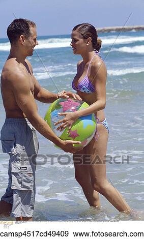 Beach, Couple, Outside, Playing, Summer, Woman View Large Photo Image Stock Photo - Beach, Couple, Outside, Playing, Summer, Woman. Fotosearch