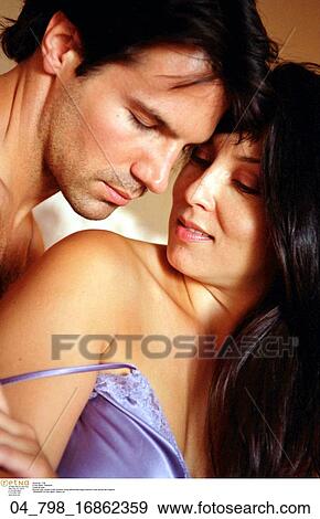 Bedroom, Couple, Woman, Romantic, Affectionate, Brunette View Large Photo Image Stock Photo - Bedroom, Couple, Woman, Romantic, Affectionate, Brunette. Fotosearch