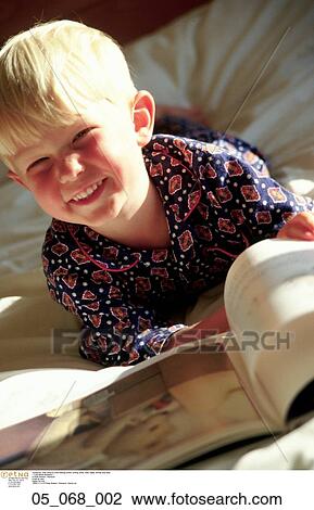 Bedroom, Smiling, Reading, Inside, Happy, Child, Boy View Large Photo Image Stock Image - Bedroom, Smiling, Reading, Inside, Happy, Child, Boy. Fotosearch