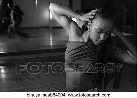 Black & White Image, Performance, Gesturing, Dreadlocks, Dramatic, Colored Hair, fitness View Large Photo Image Picture - Black & White Image, Performance, Gesturing, Dreadlocks, Dramatic, Colored Hair, fitness. Fotosearch