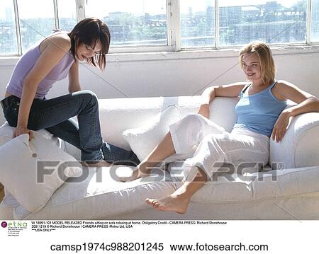 Stock Photography - blonde hair, brunette hair, daytime, european descent, Friends. Fotosearch