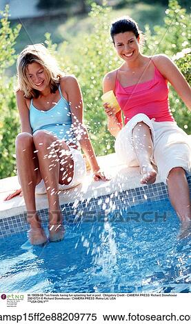 Stock Photography - blonde hair, two females, smiling, Outside, Happy, european descent. Fotosearch