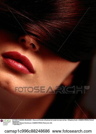 Stock Photograph - brunette hair, european descent, good condition, hair care, indoors. Fotosearch
