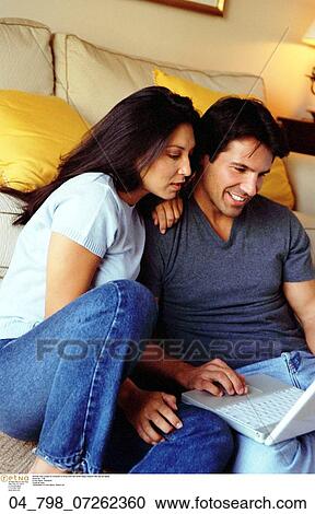 Caucasian, Couple, Brunette, Technology, Computer, At Home View Large Photo Image Stock Image - Caucasian, Couple, Brunette, Technology, Computer, At Home. Fotosearch