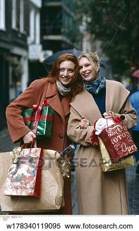 Christmas, winter, vertical image, under 35, over 35, lifestyles View Large Photo Image Stock Photography - Christmas, winter, vertical image, under 35, over 35, lifestyles. Fotosearch