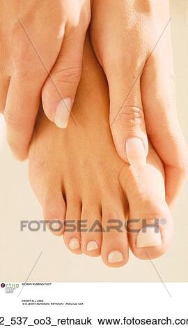 CLOSE UP, FOOT, FEET, RUB, RUBBING, CAUCASIAN, NATURAL NAIL POLISH View Large Photo Image Stock Image - CLOSE UP, FOOT, FEET, RUB, RUBBING, CAUCASIAN, NATURAL NAIL POLISH. Fotosearch