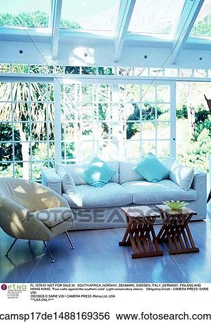 coffee tables, window ceiling, sofa, conservatory, arm chair View Large Photo Image Stock Photograph - coffee tables, window ceiling, sofa, conservatory, arm chair. Fotosearch