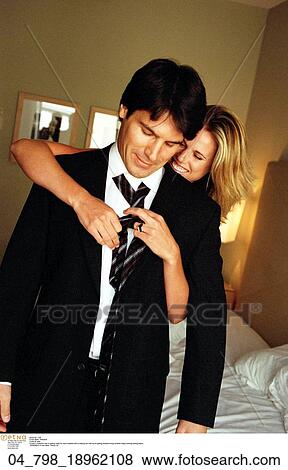 Stock Photo - Couple, Affectionate, Romantic, Inside, At Home. Fotosearch
