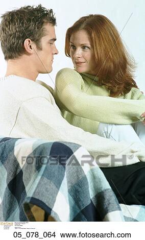 Couple, Flirting, Happy, Relaxing, Talking, Woman View Large Photo Image Picture - Couple, Flirting, Happy, Relaxing, Talking, Woman. Fotosearch