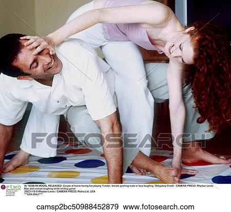 Stock Photo - Couple, play, game. Fotosearch