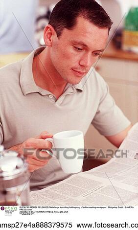Drinking, Reading, clothed, dark hair, european descent View Large Photo Image Stock Photography - Drinking, Reading, clothed, dark hair, european descent. Fotosearch