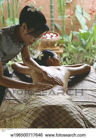 Stock Photograph - glamorous, exotic, ethnic, under 35, tropical. Fotosearch