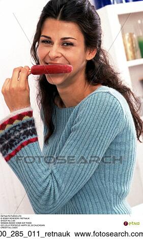 Indoors, Inside, Woman, Brunette, Eating, Happy View Large Photo Image Stock Image - Indoors, Inside, Woman, Brunette, Eating, Happy. Fotosearch