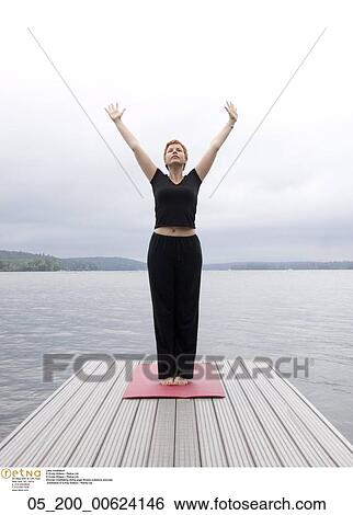 Stock Photograph - lake meditation, Fitness, Woman, Meditation, Stretching, Yoga. Fotosearch