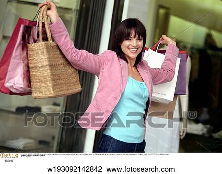 lifestyles, under 35, spending spree, solo, shopaholic, series View Large Photo Image Stock Image - lifestyles, under 35, spending spree, solo, shopaholic, series. Fotosearch