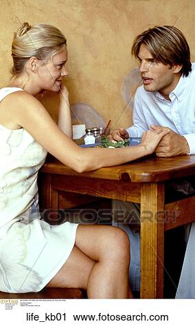Stock Image - Outside, Happy, Affectionate, Woman, Food, Couple. Fotosearch