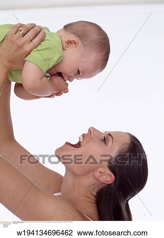 parent and child, families, 9 months, vertical image, under 35 years, under 12 months View Large Photo Image Stock Image - parent and child, families, 9 months, vertical image, under 35 years, under 12 months. Fotosearch