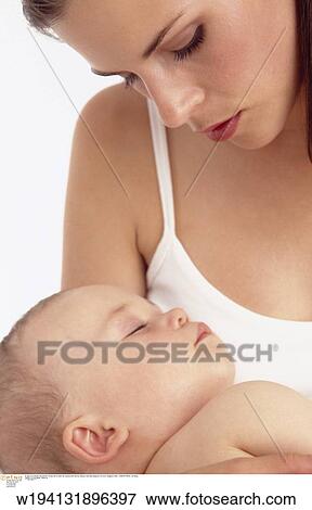 parent and child, families, 9 months, vertical image, under 35 years, under 12 months View Large Photo Image Stock Photo - parent and child, families, 9 months, vertical image, under 35 years, under 12 months. Fotosearch