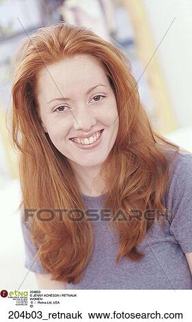 Stock Image - Red Hair, Smiling, Caucasian, Eye Contact, Happy. Fotosearch