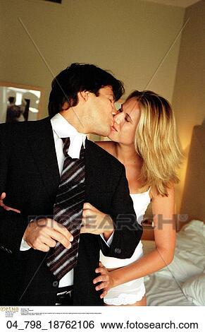 Stock Photograph - Romantic, Couple, Affectionate, Caucasian, Inside, At Home. Fotosearch