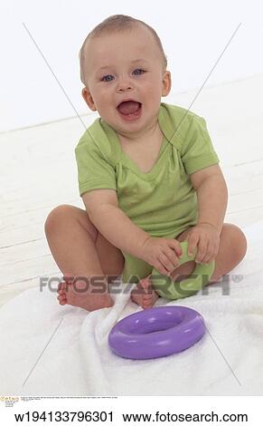 solo, families, 9 months, vertical image, under 12 months, playing View Large Photo Image Stock Image - solo, families, 9 months, vertical image, under 12 months, playing. Fotosearch