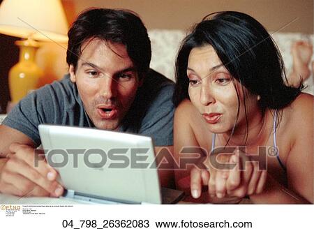 Technology, Inside, Brunette, Computer, Couple, At Home View Large Photo Image Stock Image - Technology, Inside, Brunette, Computer, Couple, At Home. Fotosearch