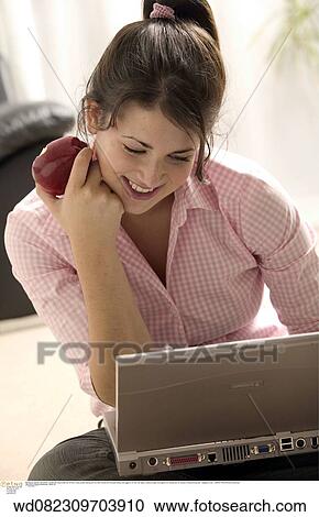 Stock Image - teenage, working, teenager, under 35, very happy, 16 years. Fotosearch