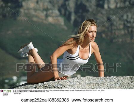 Stock Photography - under 35, blonde hair, clothed, european descent, exercising. Fotosearch