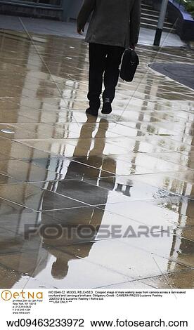 Stock Image - vertical image, solo, reflection, people, over 35, lifestyles. Fotosearch
