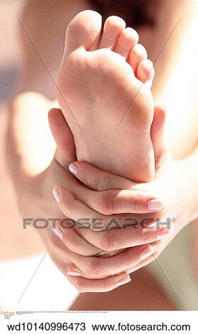 vertical image, summer, stretching, solo, lifestyles, footcare View Large Photo Image Stock Image - vertical image, summer, stretching, solo, lifestyles, footcare. Fotosearch