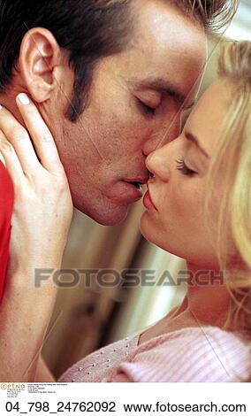 Stock Image - Woman, Couple, Caucasian, Indoors, Inside, At Home. Fotosearch