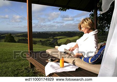 Blonde female wearing a white dressing gown View Large Photo Image Stock Photo - Blonde female wearing a white dressing gown. Fotosearch