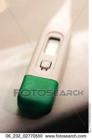Stock Image - Clinical thermometer temperature medical health equipement still life inside. Fotosearch