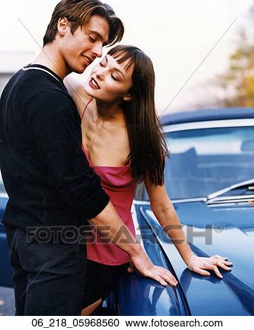 couple, outside, car, embrace, happy, flirting View Large Photo Image Stock Image - couple, outside, car, embrace, happy, flirting. Fotosearch