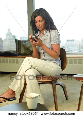 Ethnic Girl wearing a blue button down shirt View Large Photo Image Picture - Ethnic Girl wearing a blue button down shirt. Fotosearch