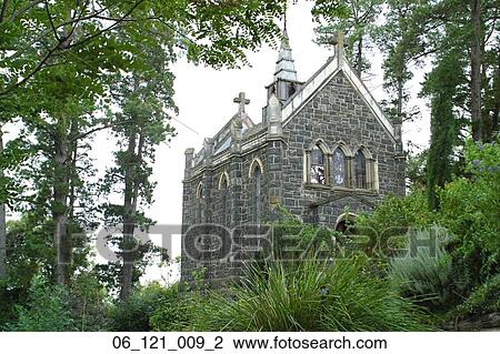 Stock Image - house outside building nature forest trees church. Fotosearch